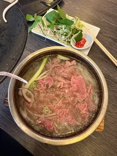 Pho with fresh Vietnamese herbs