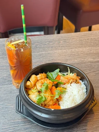 Rice bowl and iced drink at Tre Viet